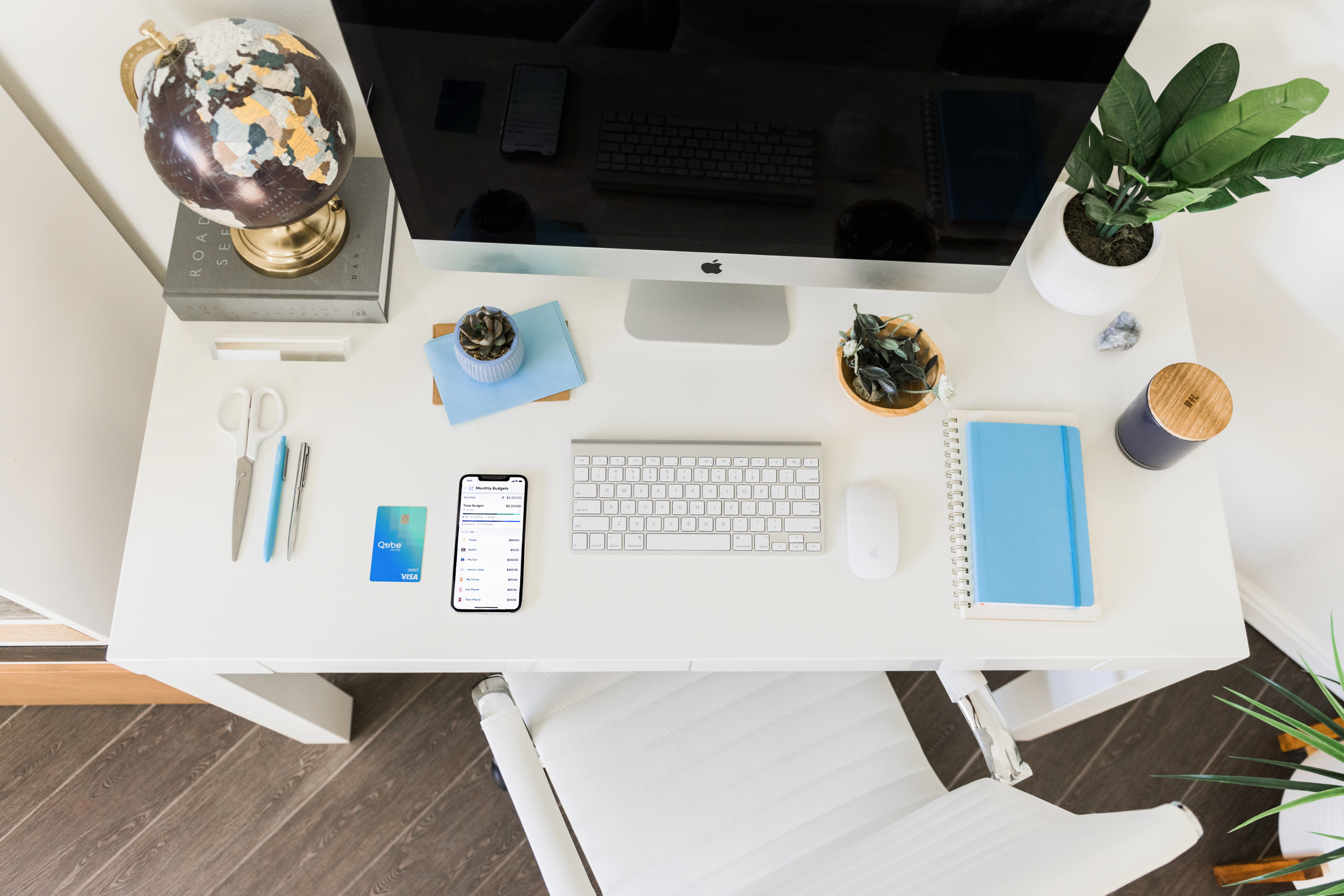 organized desk with qube money